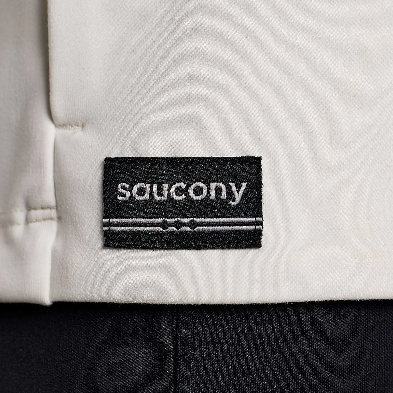 Жіночий анорак Saucony SOLSTICE OYSTERPUFF HALF ZIP Жіночий анорак Saucony SOLSTICE OYSTERPUFF HALF ZIP